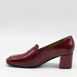 ESCARPINS À DOUBLES BOUCLES EN CUIR VERNIS